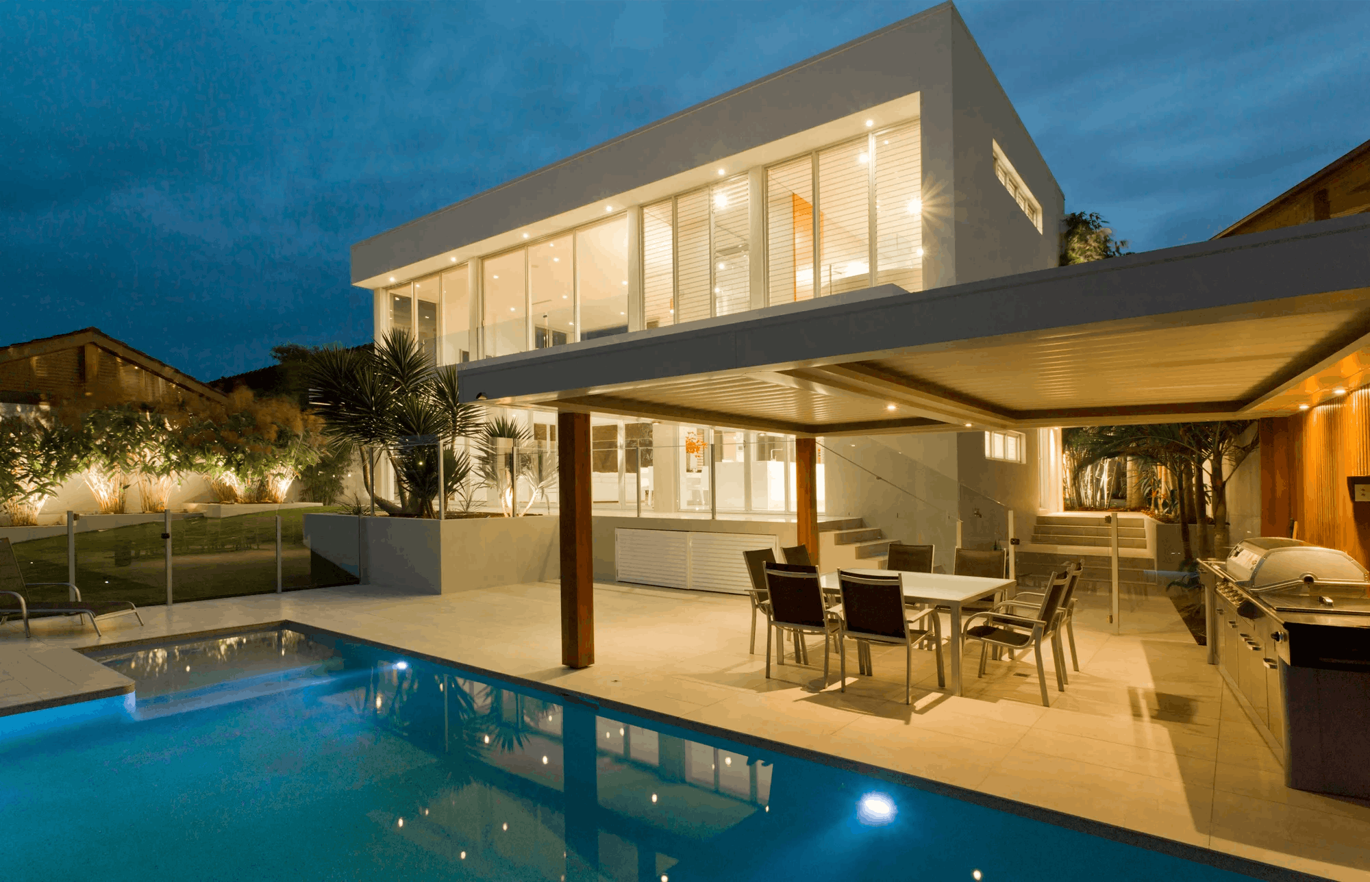 Pool fencing at a modern home in the evening